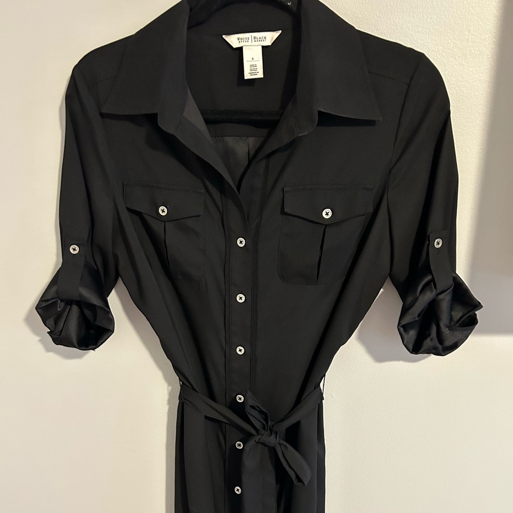 White House Black Market size 6 short sleeve black dress.